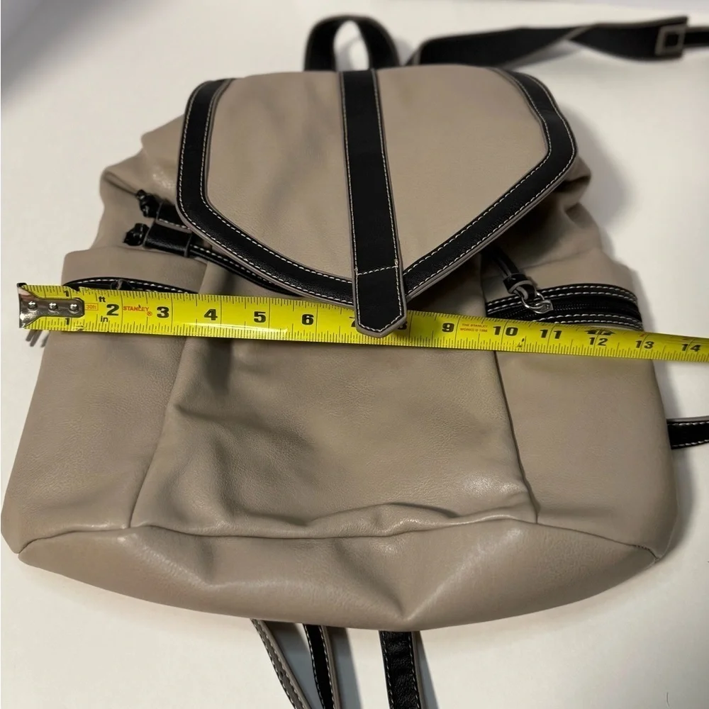 Stylish Tan and Black  Backpack purse in like new condition